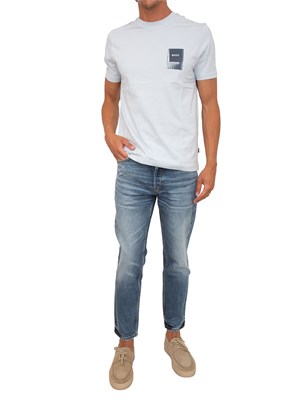 Jeans HUGO Uomo in denim medio effetto used in UOMO