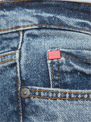 Jeans HUGO Uomo in denim medio effetto used in UOMO