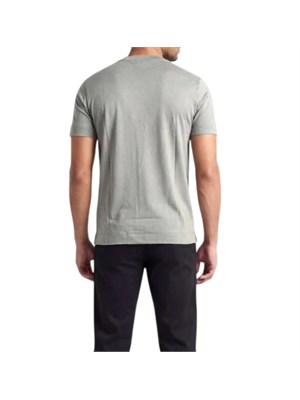 T-shirt Emporio Armani in tessuto verde con logo in UOMO