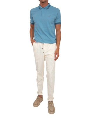 Polo SUN68 in piquet di cotone azzurro con profili in UOMO